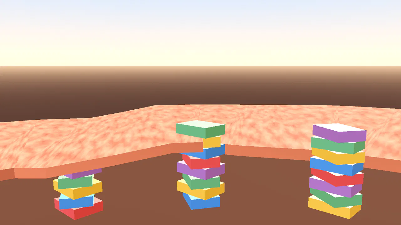 A raised toy racetrack plateau held up on columns of stacked colored building blocks.